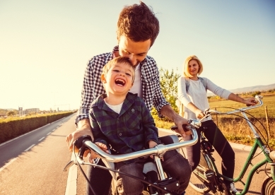 Dad and Son on Bike